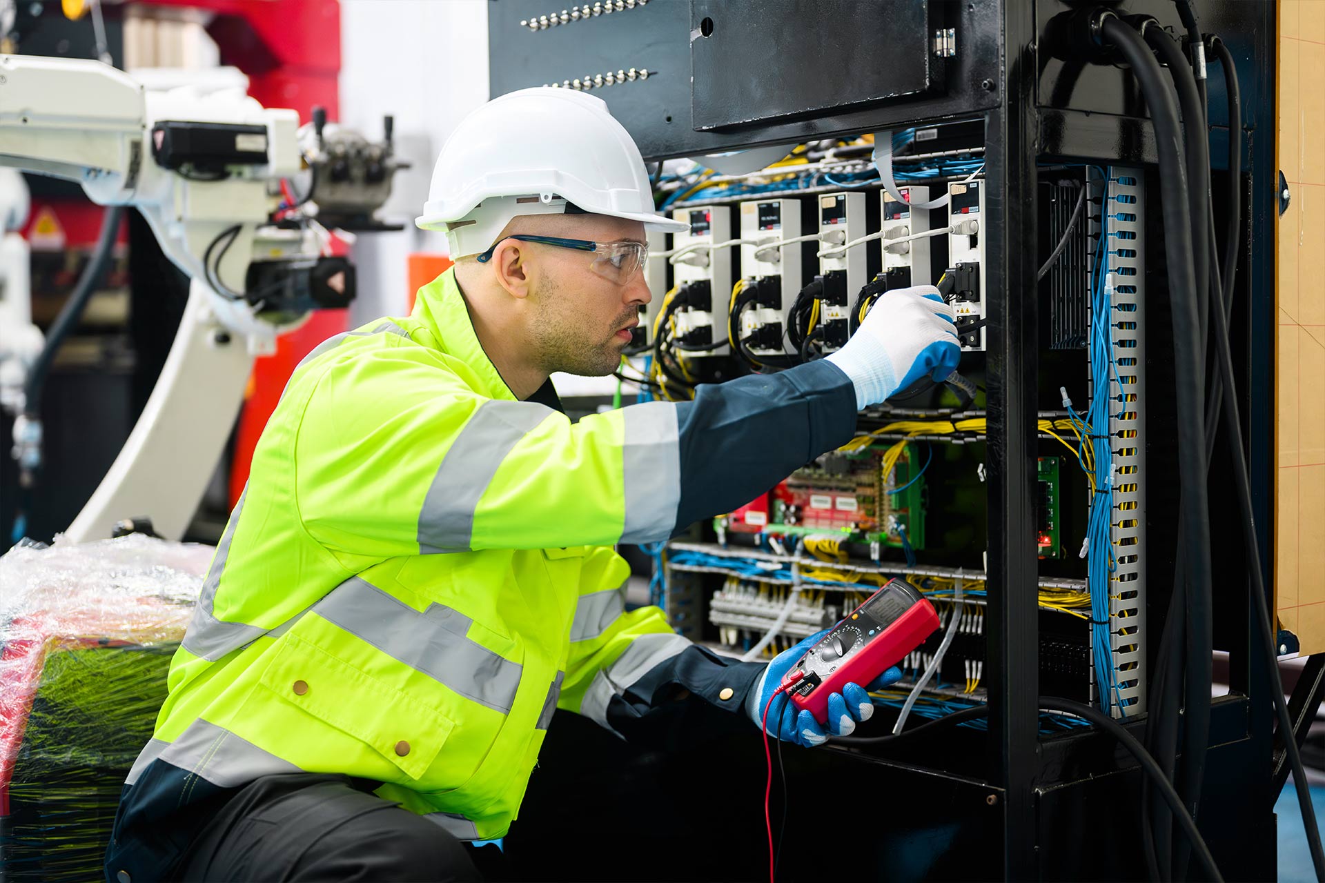 Electrician carrying out EICR testing on an electrical installation